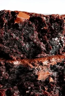 Deliciously moist zucchini brownies served on a plate, perfect for dessert lovers.